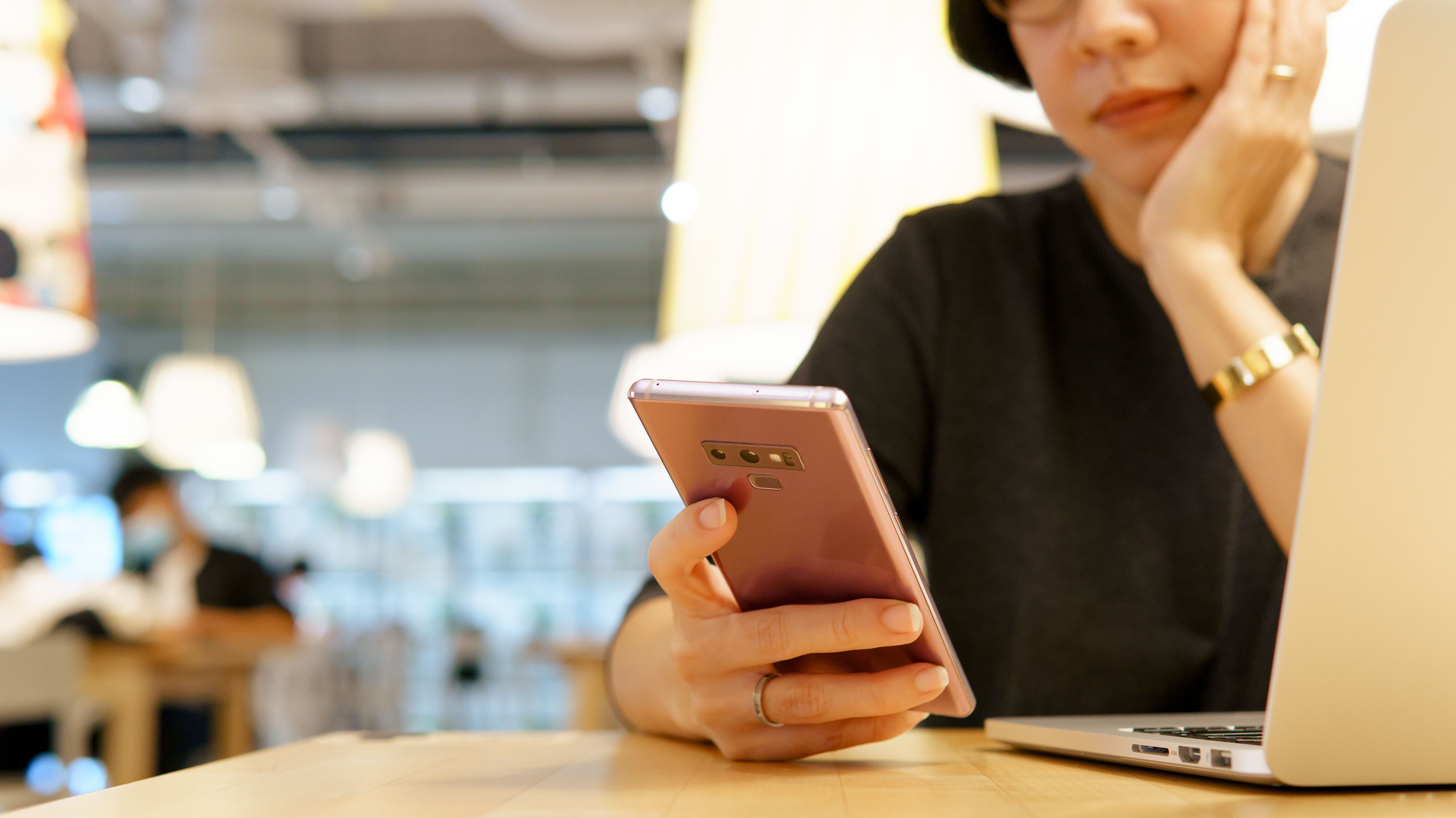 A woman completing a mental health assessment on her phone