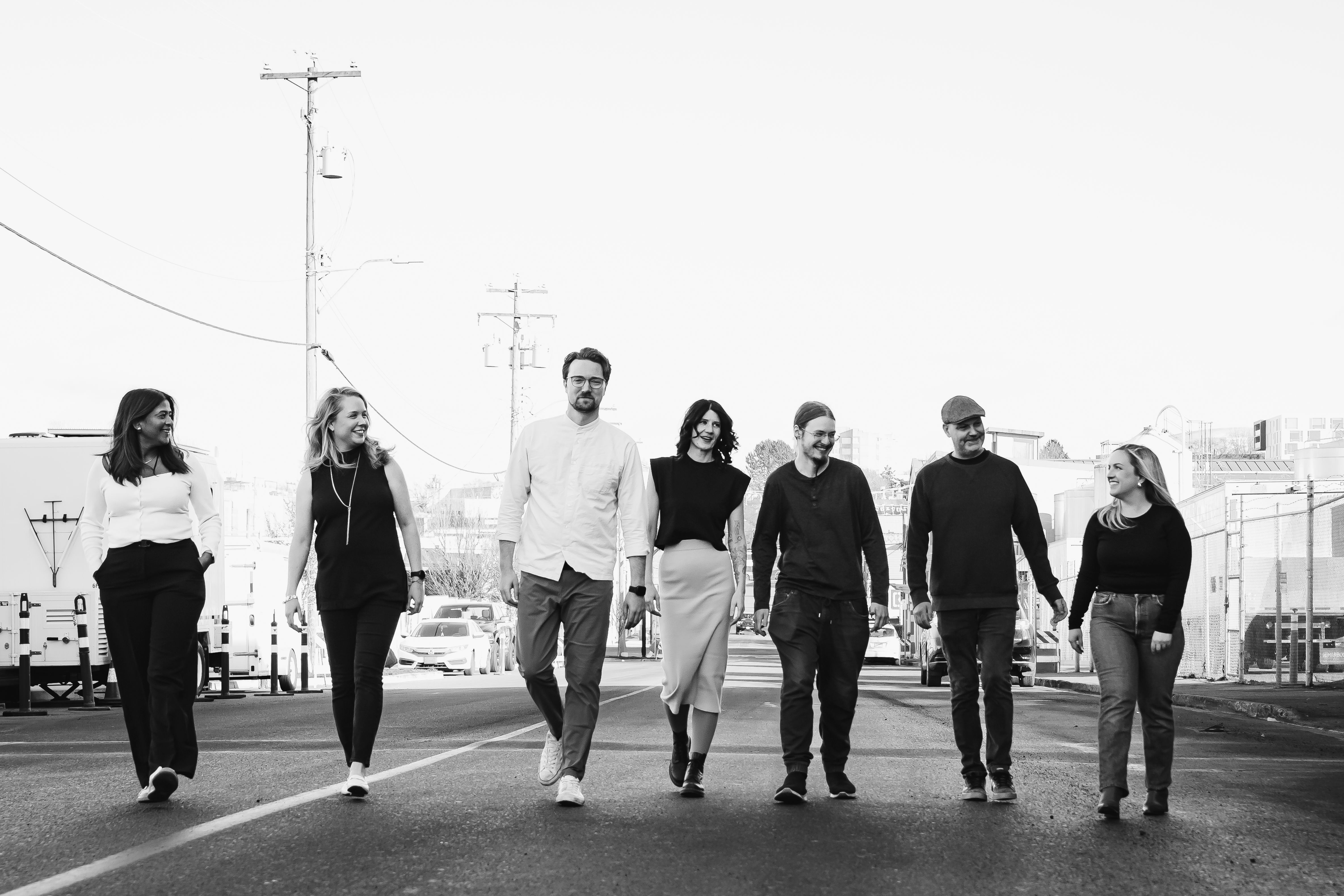 The HiBoop team standing together outside the office