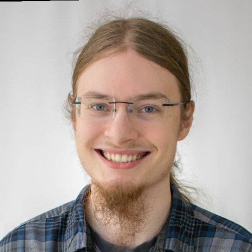 A headshot of Ben Allison